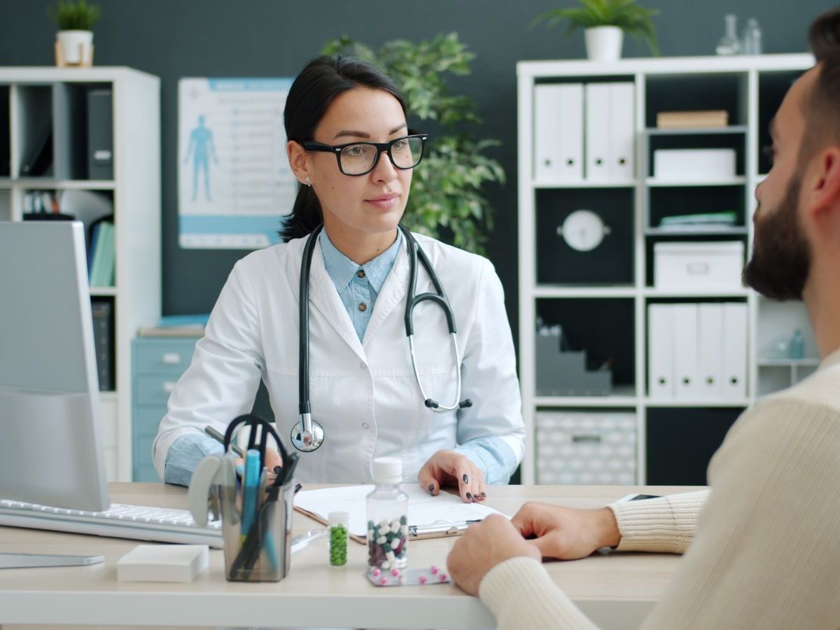 Physician reviewing a personalized treatment plan with a patient